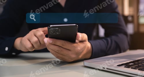 Preview: Male are using a mobile phone search information on the desk in the morning.