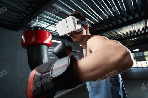 Preview: Serious adult sportsman exercising in virtual reality