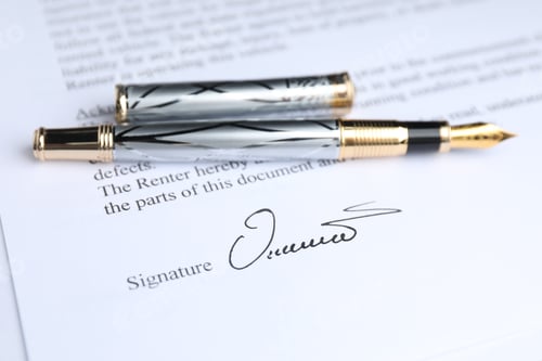 Preview: Fountain pen and signature on contract, closeup