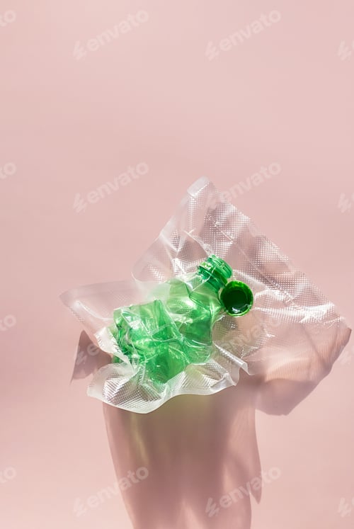 Preview: Plastic bottle in vacuum pack. Ecology and recycle concepts.