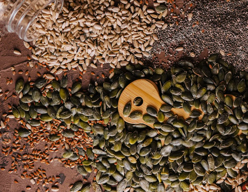 Preview: Different types of grains and seeds on shabby wooden