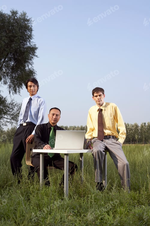 Preview: Portrait Of Business People In A Field