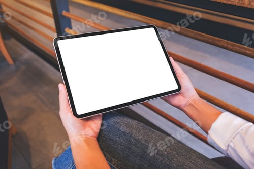 Preview: Mockup image of a woman holding digital tablet with blank white desktop screen
