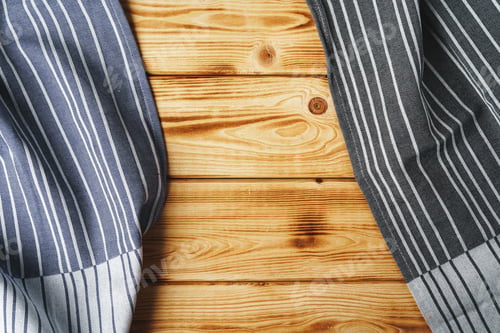 Preview: Kitchen towel or napkin over the wooden table.