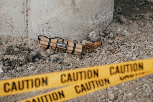 Preview: Near bridge support. Dangerous explosive lying on the ground. Yellow caution tape in front