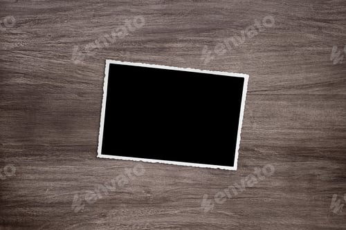 Preview: blacked out old vintage photo template on wooden background