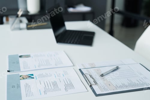 Preview: Questionnaires of candidates on table