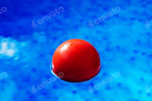 Preview: Red ball in swimming pool
