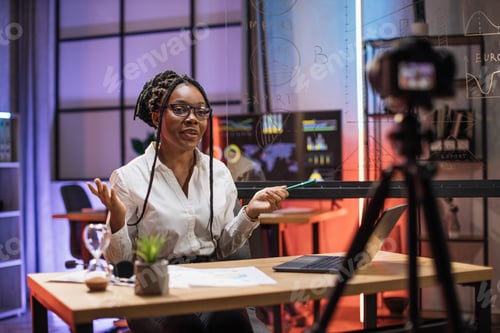 Preview: Portrait of confident experienced smart female african american office manager in headset