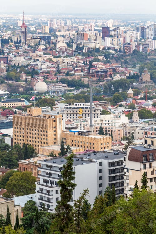 Preview: above view of Tbilisi city with Liberty Monument