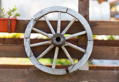 Preview: Old wooden wagon wheel.
