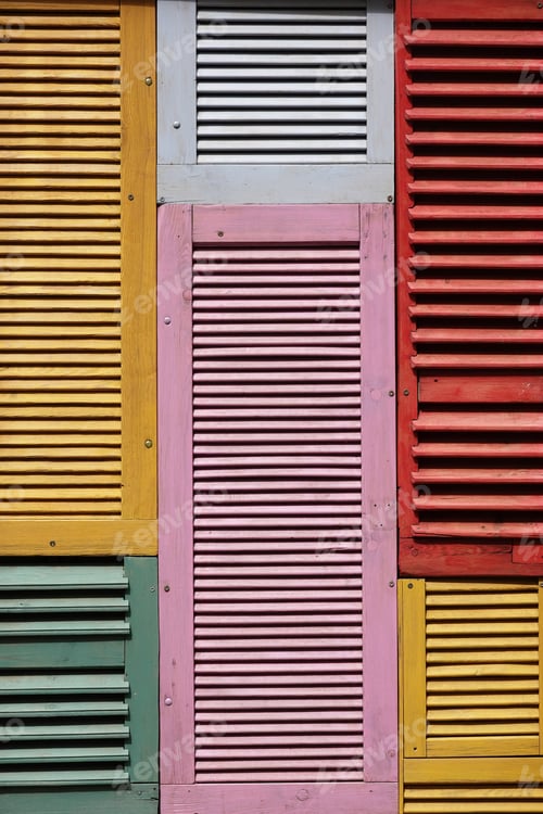 Preview: vertical background made of many wooden shutters painted in bright colors