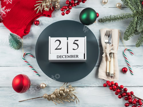Preview: Christmas festive table setting with decor, blue plate with calendar