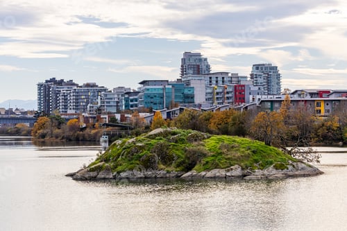 Preview: Scenic View of Victoria Skyline and Coastal Island Reflection