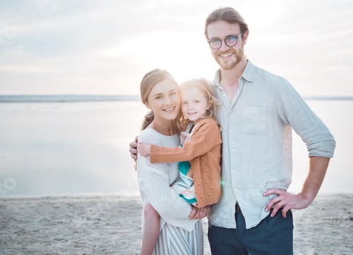 Preview: Shot of a couple and their daughter spending the day at the beach