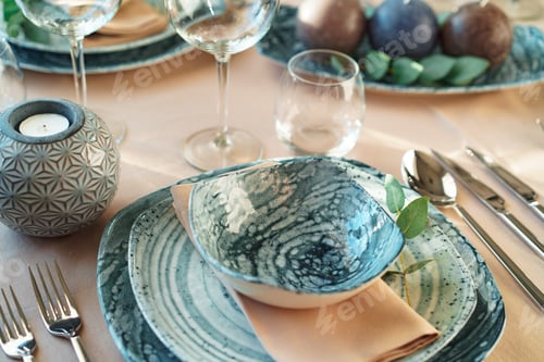 Preview: Beautiful elegant table setting with green stylish dishware and silver cutlery