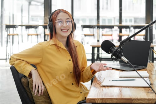 Preview: Female podcaster making audio podcast from her home studio