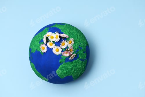 Preview: Earth model planet with daisies
