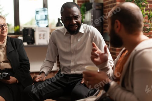 Preview: Close up of multi ethnic people having discussion about issues at aa group meeting