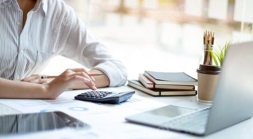 Preview: Asian accountant working and analyzing financial reports project accounting with chart graph and