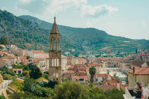 Preview: Panoramic view of Hvar town with its historical bell tower and surrounding mountains