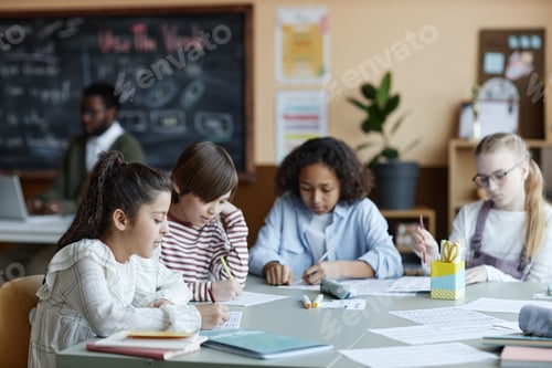 Preview: Group Of Kids Studying In Class