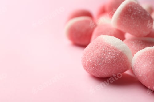 Preview: Closeup of sweet jelly candies on pink background. Space for text