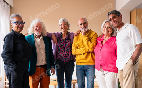 Preview: Group of senior friends bonding at home for dinner party