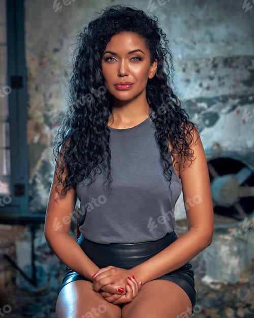 Preview: Portrait of young hot woman posing in studio