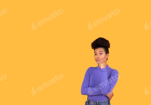 Preview: A woman stands thoughtfully with her hand on her chin, dressed in a purple top