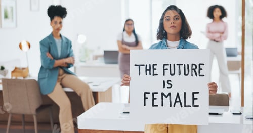 Preview: Equality, empowerment and female leader holding a sign in the office with her business woman group
