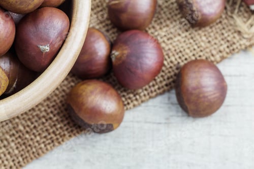 Preview: Chestnuts on wooden