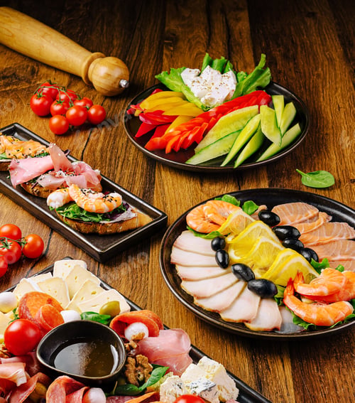 Preview: Delicious gourmet appetizer platter displayed on rustic wooden table