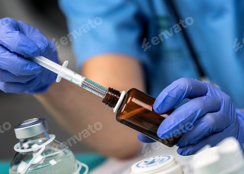 Preview: Nurse preparing medication for parenteral nutrition in a hospital, conceptual image