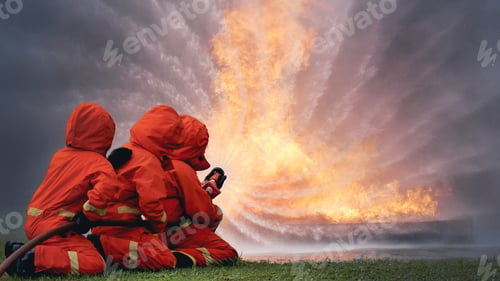 Preview: Firefighter Rescue team training in fire fighting extinguisher. Firefighter teamwork fighting