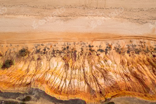 Preview: Praia da Falesia, Algarve beach in Albufeira, Portugal. Aerial drone view at sunset