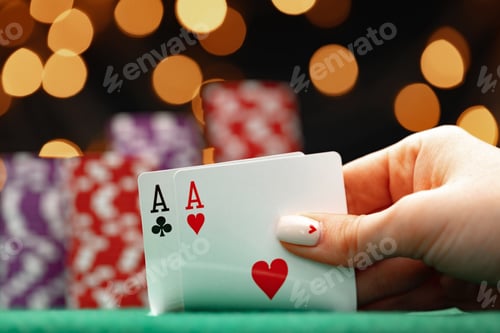 Preview: Female holding playing cards, playing poker at green table