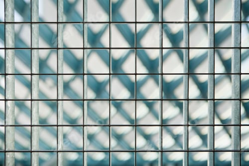 Preview: Grid pattern, barrier with square metal shapes, diamond shape blurred background.