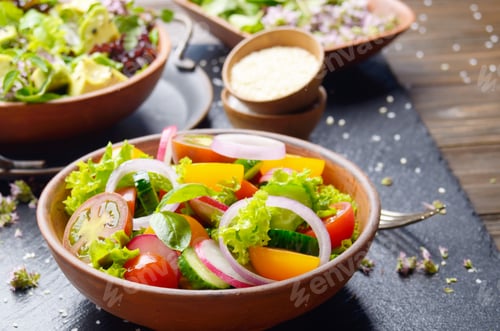 Preview: Vegetable salad of lettuce, cherry tomatoes, radish, cucumber, o