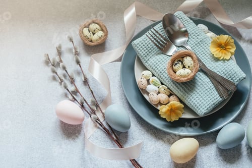 Preview: Minimal Easter flat lay with festive Easter tableware, Easter eggs, willow catkin branches
