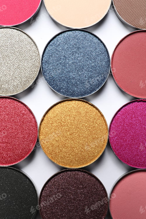 Preview: Different beautiful eye shadows on white background, flat lay
