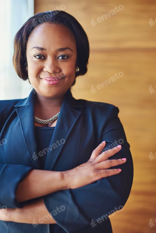 Preview: Portrait of a confident businesswoman standing in her office