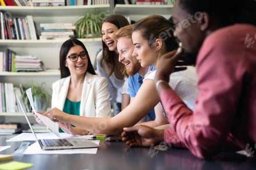 Preview: Cheerful coworkers in office during company meeting