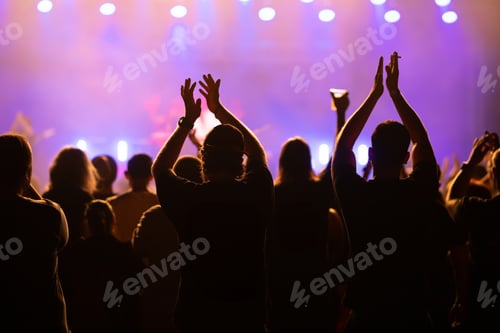 Preview: Crowd at concert and blurred stage lights.