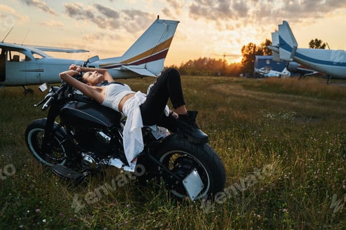 Preview: Joyful female person having rest on the airfield