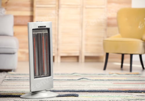 Preview: Modern electric infrared heater on floor at home. Space for text