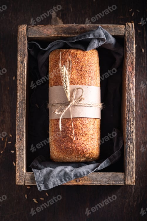 Preview: Fresh loaf of breads made with flour, sourdough and water.