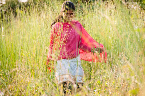 Preview: Beautiful young girl outdoor enjoying nature. young girl in meadow.