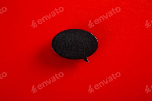 Preview: Black speech bubble communicating on vibrant red background