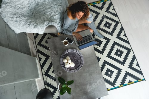 Preview: Young Woman working from home